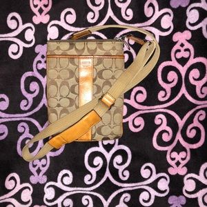 Tan monogram crossbody